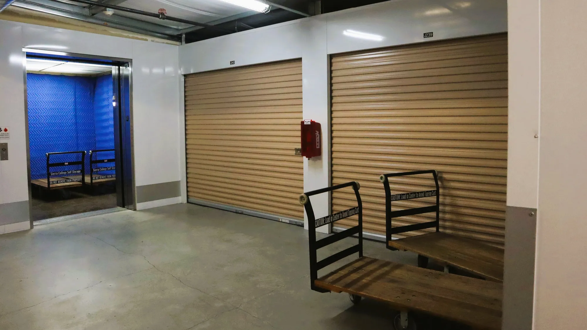 Freight elevator and free moving carts on an indoor storage level at Sierra College Self Storage