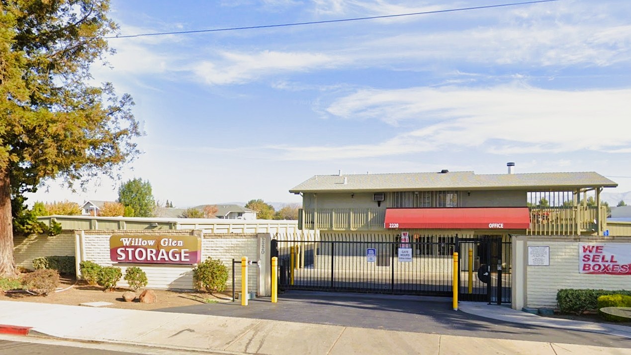 Willow Glen Storage's street frontage: monument sign, gated entrance and the office beyond